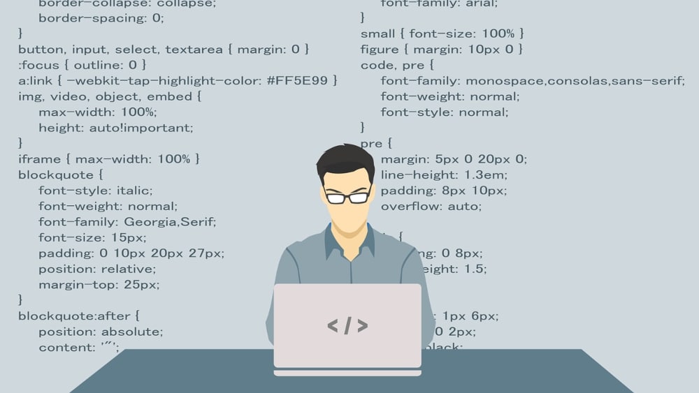 Man writing code on his computer